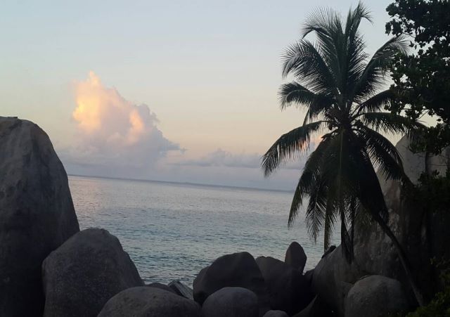 rocks sea sunset seychelles
